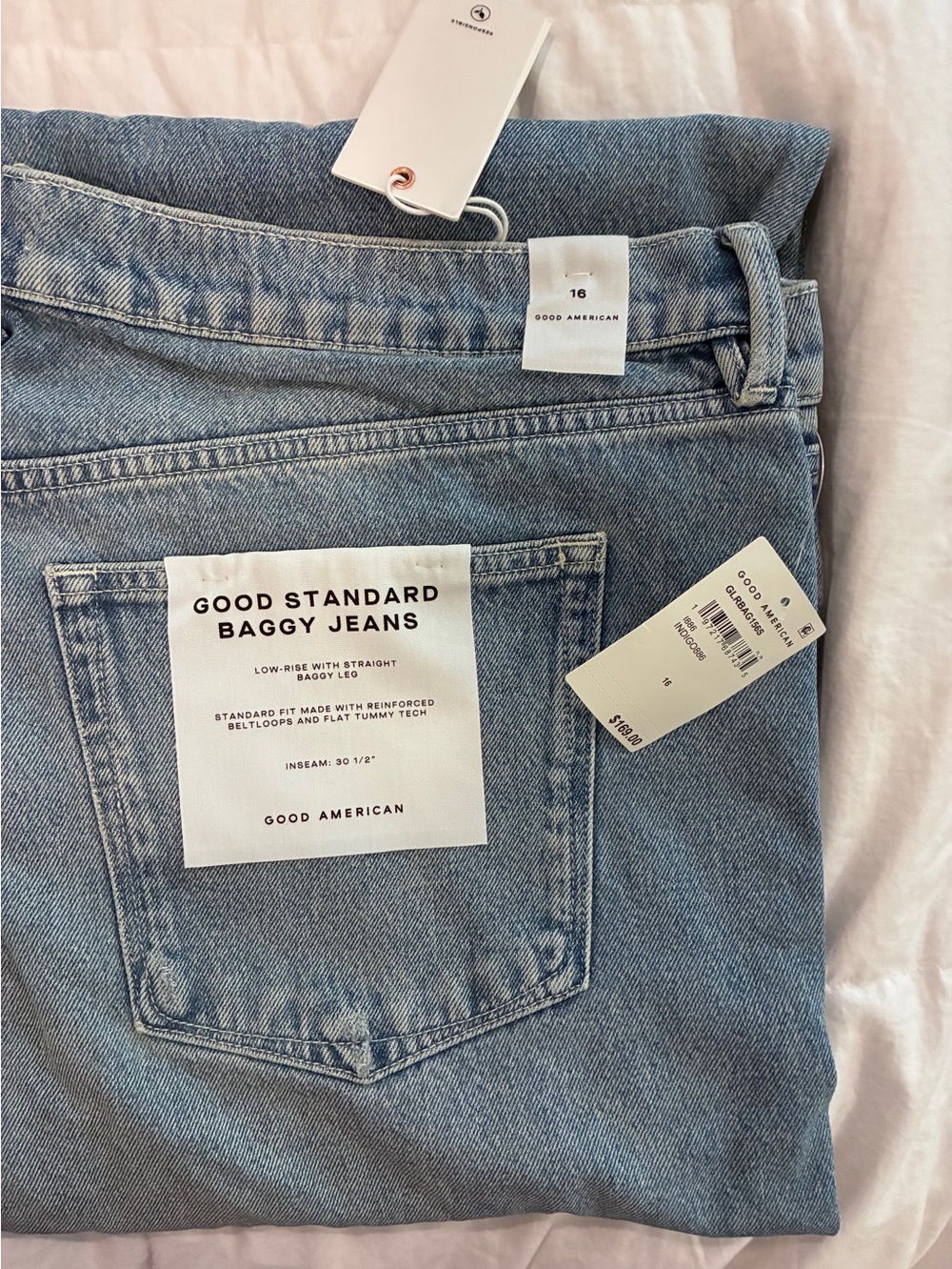 Good American Faded Blue Relaxed Straight Jeans with Distressed Knee - Picture 7 of 8